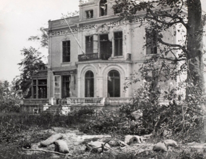 The Hotel Hartenstein as it appeared in 1945, shortly after Operation Market Garden. From a photograph album compiled by Frank Tomlinson, 74th Field Regiment, Royal Artillery of North West Europe from 1944-46. Held in the National Army Museum. Accession number: NAM. 2014-08-16-447