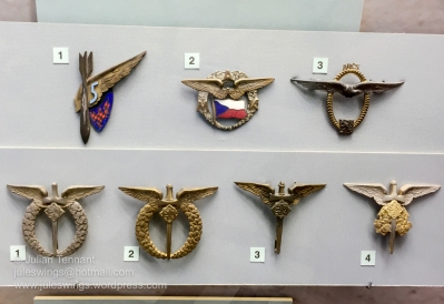 Inter-war period Czech Air Force insignia. Top Row: No.1. Unofficial badge of 5 Aviation Regiment in Brno. No.2. Moravian Aero Club badge. No.3. Republic of Czechoslovakia Aero Club badge. Bottom Row: No.1. Field Pilot qualification. No.2. Field Observer qualification. No.3. Field Air Gunner qualification. No.4. Field Air Observer of Arms.