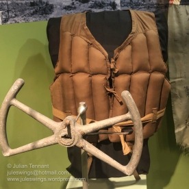 Japanese life preserver and control wheel from a Mitsubishi Ki-21 heavy bomber. The life-preserver vest was worn by Japanese pilot Hajime Toyoshima who flew a Mistubishi Zero fighter during the first raid on Darwin on 19 February 1942. Toyoshima became the first prisoner of war taken in Australia during WW2 after his aircraft made a forced landing on Melville Island. He later became one of the leaders of the breakout from Cowra POW camp in NSW and committed suicide following recapture in August 1944. Photo: Julian Tennant