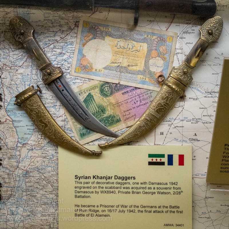 Syrian Khanjar Daggers. This pair of decorative daggers, one with Damascus 1942 engraved on the scabbard was acquired as a souvenir from Damascus by WX8940, Private Brian George Watson of the 2/28th Battalion. He became a POW of the Germans at the Battle of Ruin Ridge on 16/17 July 1942, which was the final attack of the first Battle of El Alamein. Photo: Julian Tennant