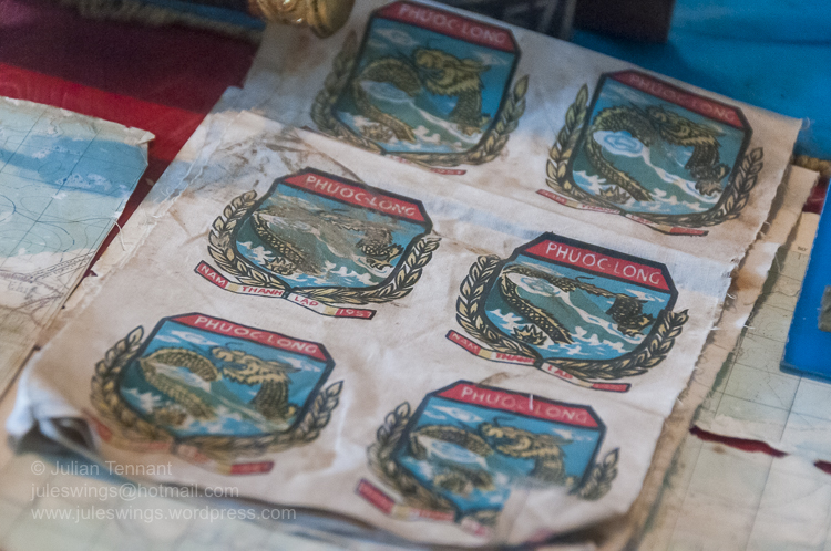 Captured sheets of printed South Vietnamese patches. I am not sure if this is an ARVN or Navy unit patch. Photo: Julian Tennant