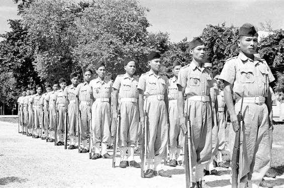 Cao Đài troops on parade at Tây Ninh in 1950. Photo: Harrison Forman