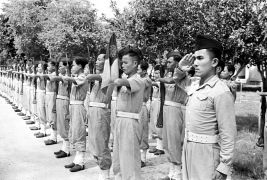 Cao Đài troops present arms during a parade at Tây Ninh in 1950. Photo: Harrison Forman LIFE Magazine