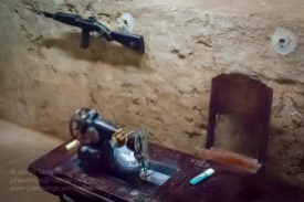 M2 carbine and sewing machine in one of the workshop displays at the Cu Chi Tunnel theme park. Photo: Julian Tennant
