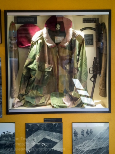 Objects relating to the Royal Ulster Rifles. The Dennison smock was worn on D-Day and during the Battle of Normandy by Captain Bob Sheridan, Adjutant of the 1st Battalion Royal Ulster Rifles. Photo: Julian Tennant