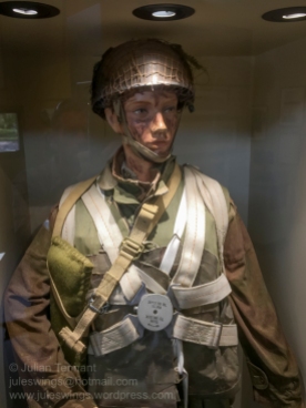 British paratrooper kitted out for the jump into France in advance of the D-Day landings. He is wearing the British X-Type parachute over the 1942 Pattern Parachutist Oversmock and Mk1 Parachutist helmet. Photo: Julian Tennant