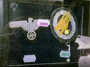 German insignia for sale in the 'Paratrooper' shop at the Dead Man's Corner Museum. Photo: Julian Tennant
