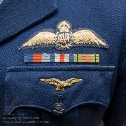 Pilot wings, ribbons and Pathfinder badge on the tunic of Robert Newbiggin who joined the RAAF in 1942 after serving in the Militia. From 1944 - 45 he flew heavy bombers in Europe with 195 and 35 Squadrons RAF, the latter being part of No. 8 Group (Pathfinder Force). Photo: Julian Tennant