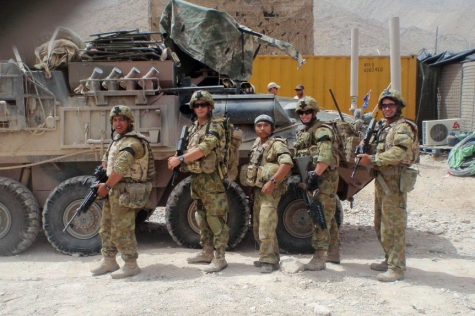 Brian Enad (centre) with fellow soldiers from 6RAR in Afghanistan. Photo courtesy of Brian Enad.