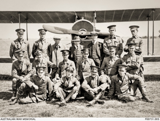 Richmond, NSW. 1917. Probably Australian Flying Corps (AFC) trainees and instructors of the NSW Aviation School in front of a Curtiss Jenny (JN) aircraft at Ham Common near Richmond. Back row, left to right: S. C. Francis; Alfred C. (Alf) Le Grice; David Reginald (Reg) Williams; William John (Billy) Stutt; Richard Henry Chester; F. C. Collins; L. C. Royle. Middle row: J. H. Summers; Derek Hudson; Brian Lucy; Burton B. Sampson; Walter Roy Boulton; M. A. Watts. Front row: H. G. Murray; Lewis Audet; Gordon Vincent Oxenham (later posted to 1 Squadraon AFC and shot down and killed in Palestine on 27 June 1918. He has no known grave and is commemorated on the Jerusalem Memorial, Israel: W A. McDougall. AWM Accession Number: P00731.005