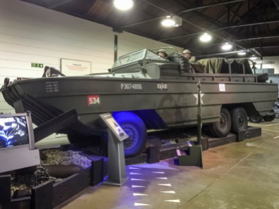 A DUKW amphibious vehicle, Registration 73 YP 44, Chassis 353/15418, Class 3 as displayed at the D-Day Museum in 2015.. It has been given representative markings of A Platoon, 101 Company (Amphibian), Royal Army Service Corps, which served with the British 3rd Infantry Division on D-Day. The history of this vehicle is only known from 1965 onwards, when it was part of HQ Army Emergency Reserve of the RCT (Royal Corps of Transport), then a number of different establishments from October 1965 including the Central Vehicle Depot, Hilton and the Proof & Experimental Establishment, Shoeburyness, before being struck off on 24 October 1974. It is believed to have been one of the last DUKWs left serving with the British Armed Forces.
