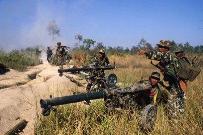 07 Jan 1985, Ampil, Cambodia --- Vietnamese soldiers during the battle of Ampil in Cambodia. Photo: Alain Nogues/CORBIS SYGMA